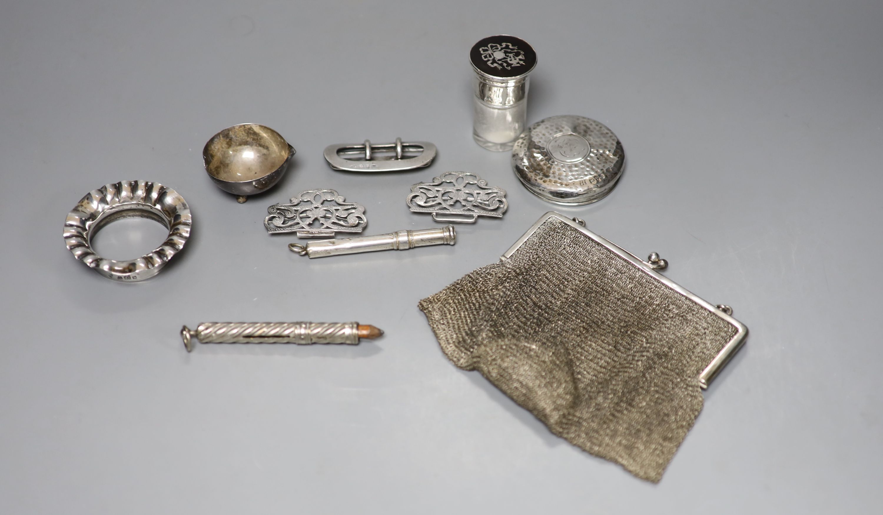 A group of small silver including mesh evening bag, buckles, salts bottle etc.